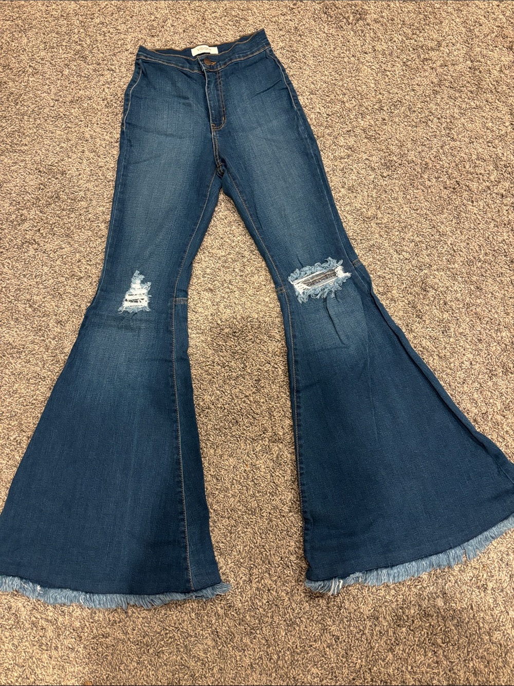 High-Rise Dark Blue Flare Jeans with Distressed Knees
